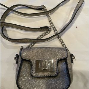 Little girls silver sparkling purse with a chain